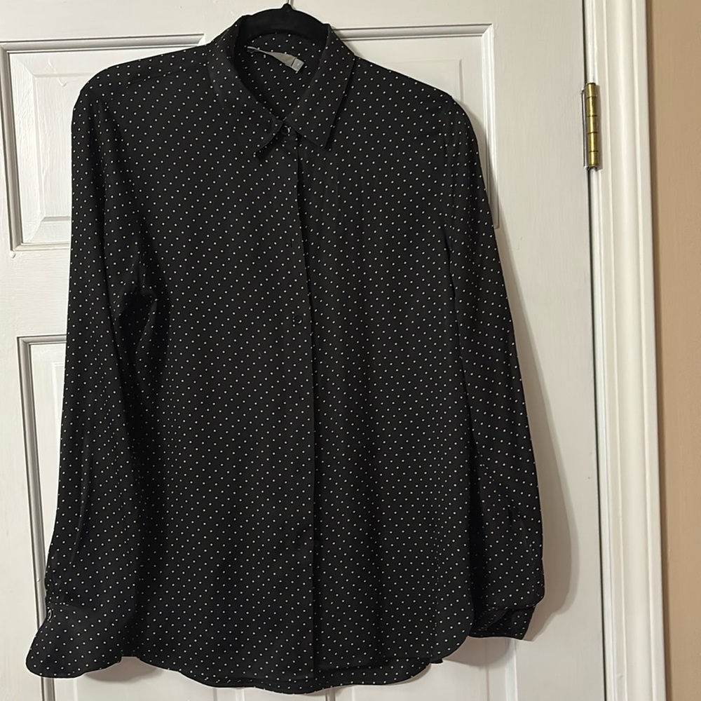 Black and white size small runs more like a size medium silk blouse